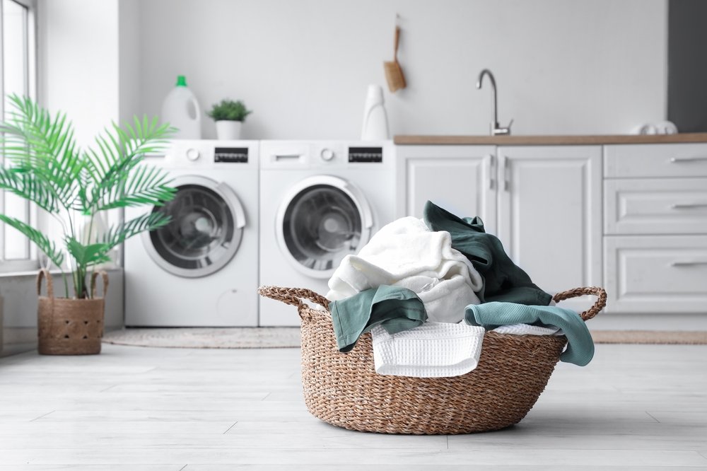 Dirty laundry getting washed with Eco Laundry Detergent Sheets.